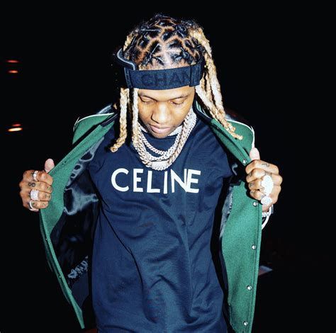 rapper wearing celine blouse